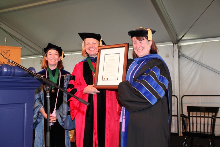 Dr. Elizabeth Corwin and Dean Linda McCauley present Dr. Kate Yeager with the Emory Williams Award for Distinguished Teaching