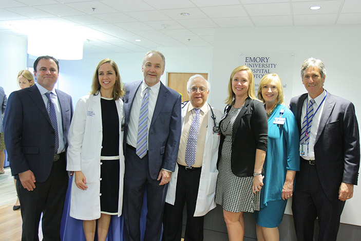 Peter Rossi, MD, Shannon Kahn, MD, Walter Curran, MD, executive director of Winship Cancer Institute, Paul Scheinberg, chief medical officer of Emory Saint Joseph¿s Hospital, Heather Dexter, CEO of Emory Saint Joseph¿s Hospital, Rebecca Heitkam and Bruce Hershatter, MD