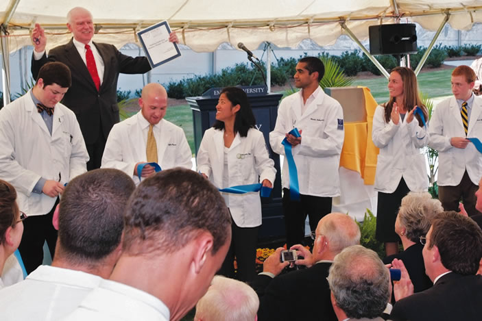 Medical students cut the ribbon to open the new medical education building in 2007