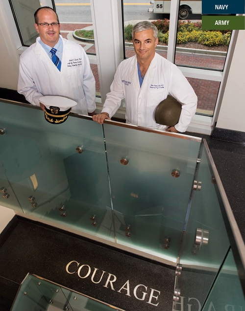 The word courage has special meaning for newly retired military officers Michael Zwick (left) and Cletus Arciero (right). Zwick, director of the Emory Integrated Genomics Core, served in the Navy for 25 years and retired as a Commander and surface warfare officer. Arciero, a surgical oncologist specializing in breast cancer and melanoma, served in the Army for 25 years and retired as a Colonel and chief of General Surgery at the Eisenhower Army Medical Center at Fort Gordon, Georgia.