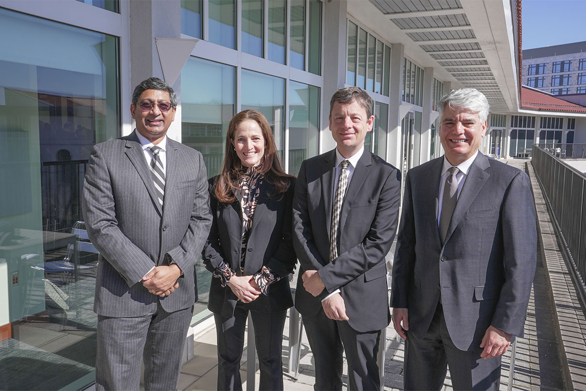 Emory Provost Ravi V. Bellamkonda, Rebecca Ginzburg 99BBA, Dean Gareth James, and Emory President Gregory L. Fenves.