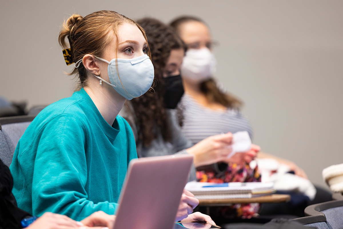 college student in class wearing mask